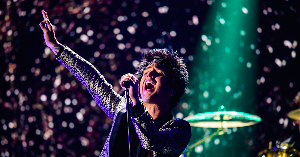 This article is about Green Day frontman condemning anti-trans rhetoric. In the photo, Billie Joe Armstrong of Green Day performs at the 2019 iHeartRadio Music Festival.