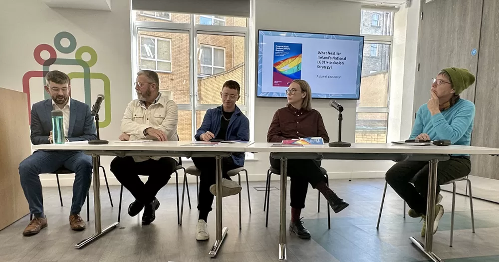 Photo from launch of report on LGBTI+ Inclusion strategy, with panel of activists discussing findings while sitting at a table.