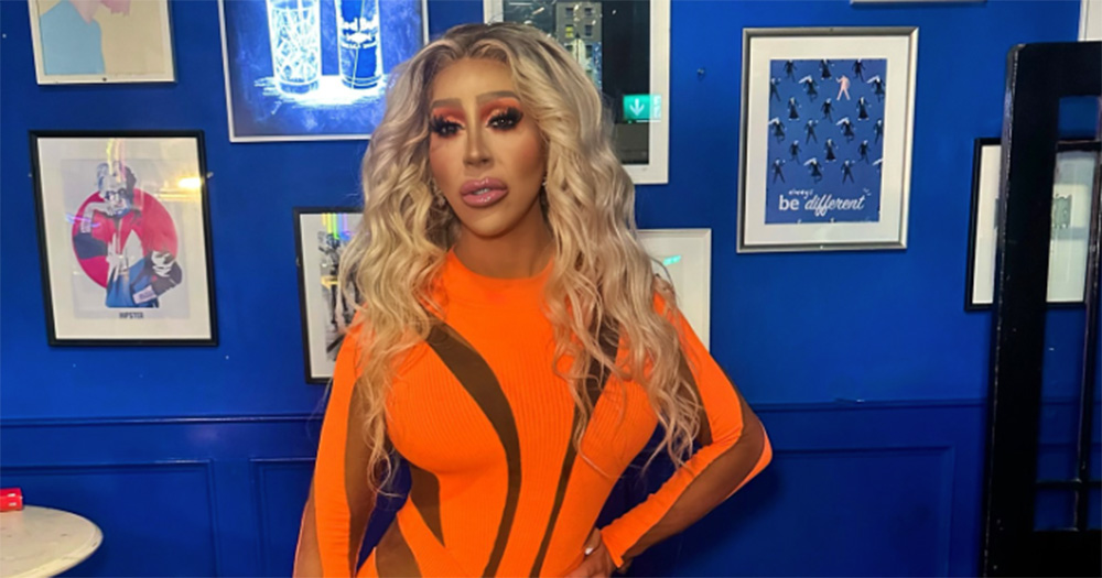 Drag Queen Davina Devine in an orange jump suit.