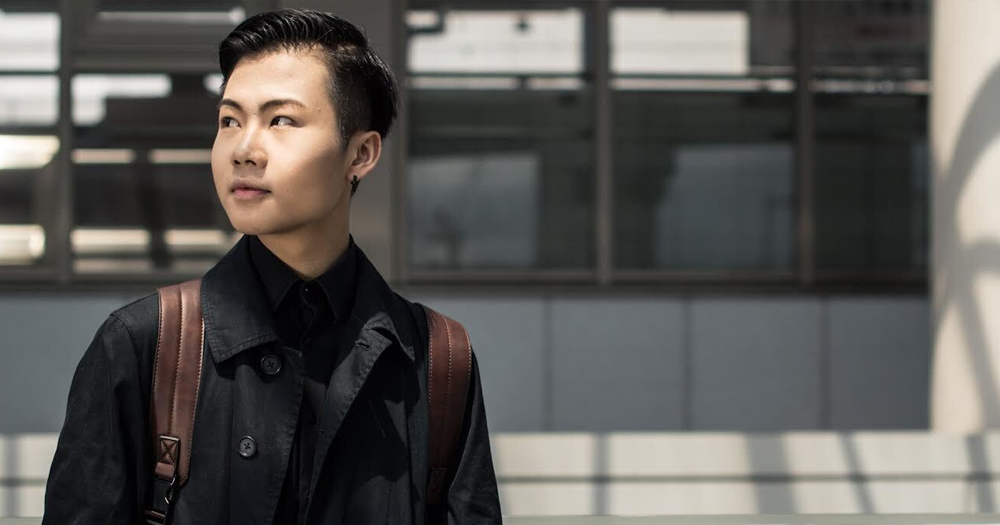 Portrait photograph from the Japan Elska issue featuring a Japanese man wearing black dress shirt