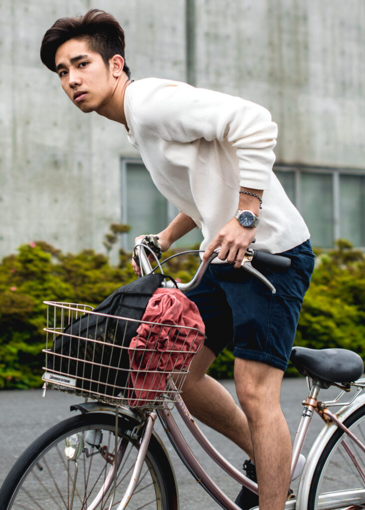 Photo of man riding a bicycle in the Elska magazine's Japan issue