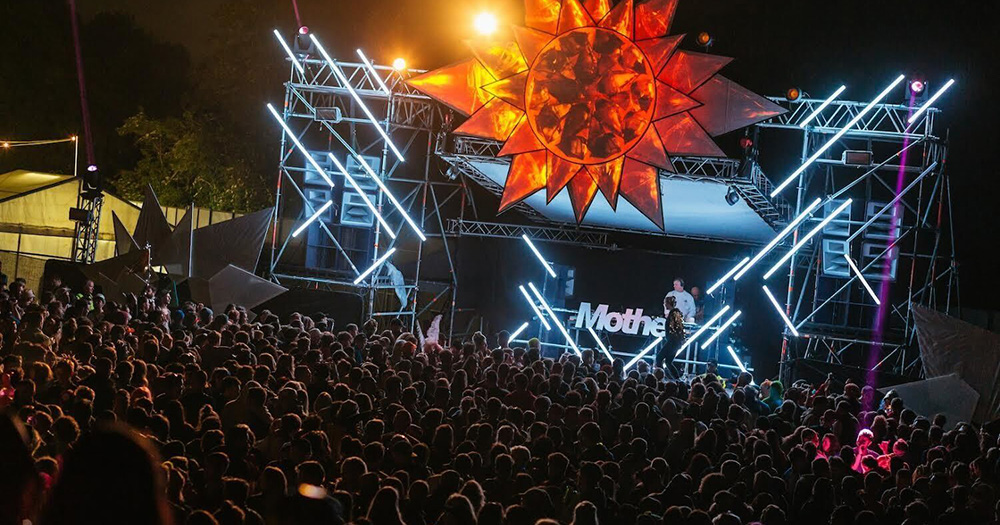 Photo of late-night outdoor festival with people dancing, taken from Mother's After Dark Queer Dance Party at Electric Picnic.