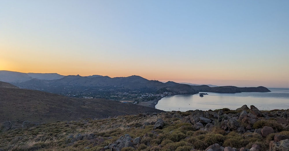 Photo of Lesbos, the island where the Queer Ranch Festival takes place, showing the sea in the background and nature.