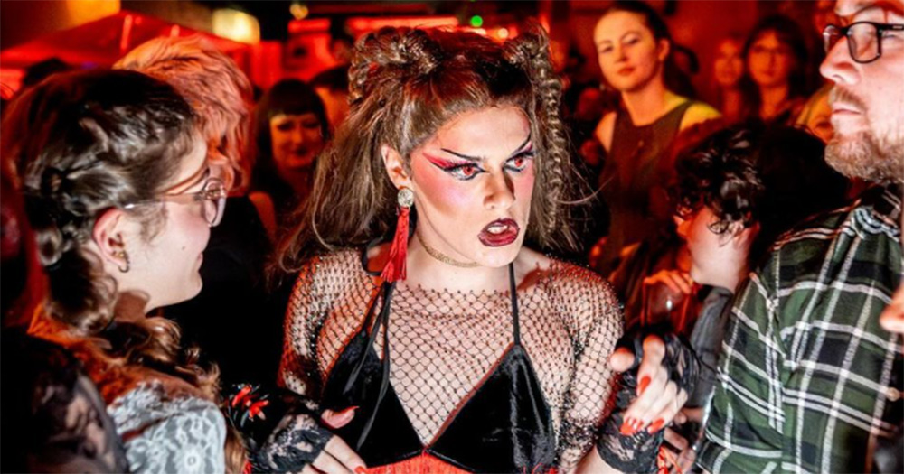 An image of a drag performer in the crowd at Zoo Night.