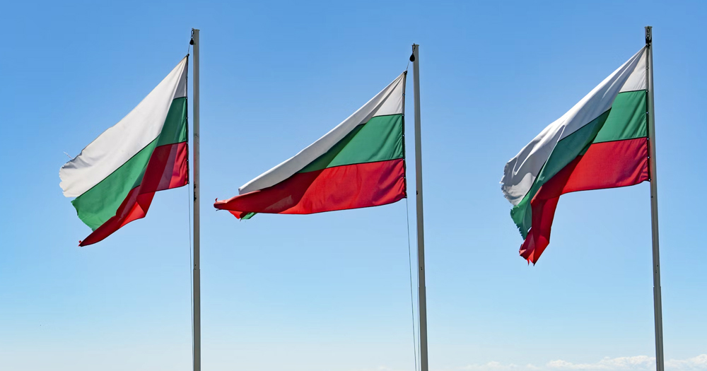 Three flags of Bulgaria, where a law banning anti-LGBTQ+ propaganda was passed. The flags have three stripes in white, green and red.