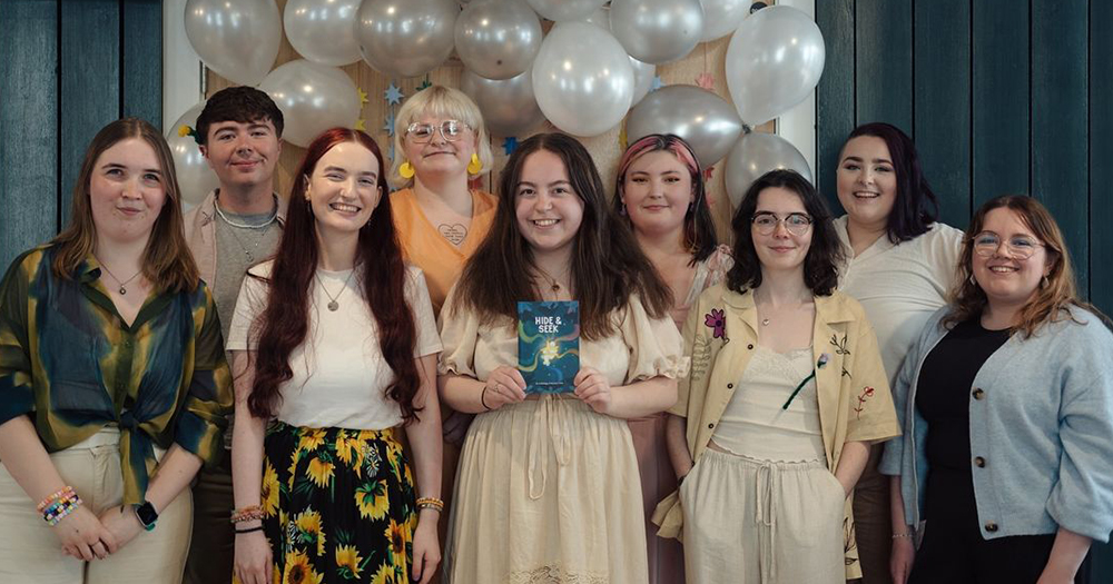 Members of Faerie Press posing for a group photo at the launch of their first book Hide and Seek.