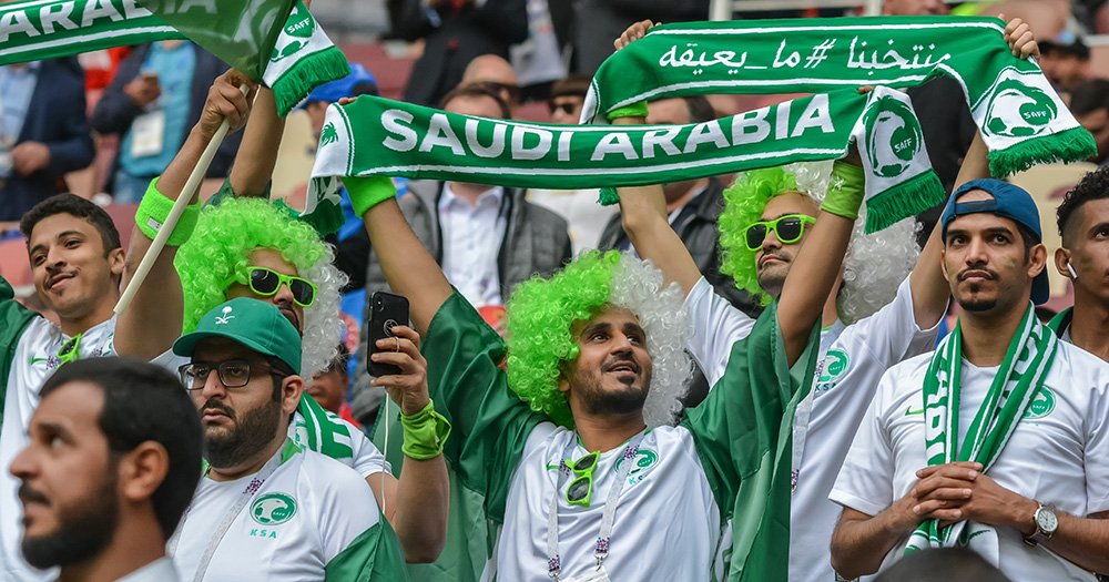 A crowd of Saudi Arabia fans at a World Cup match.