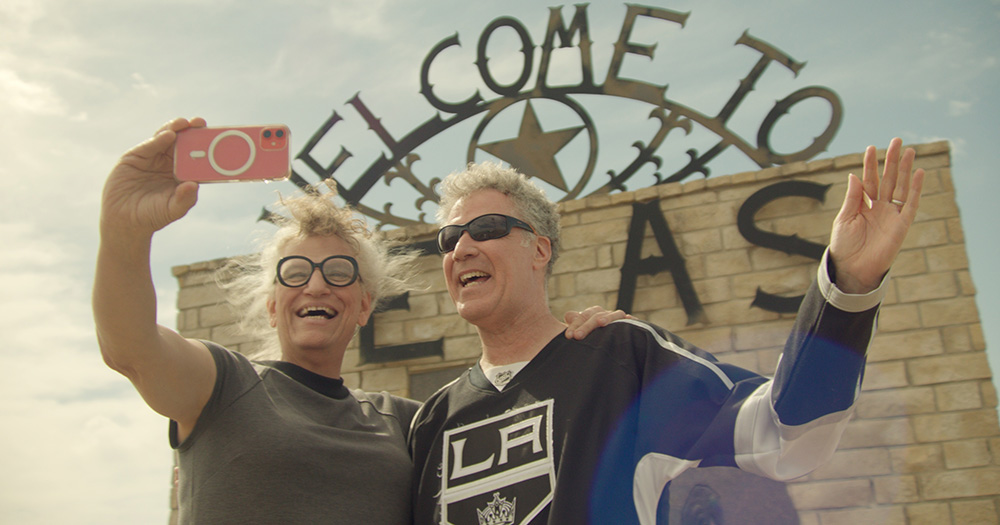 Screenshot from Will & Harper documentary, showing Will Ferrell and Harper Steele posing for a selfie.