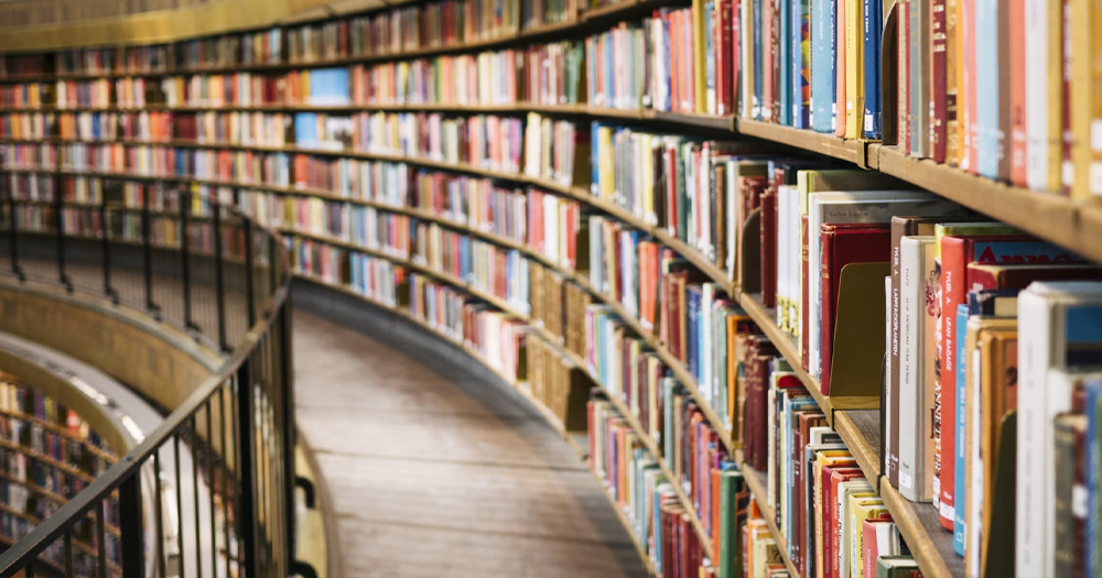 This article is about a far-right group planning to burn books. In the photo, books in a library.