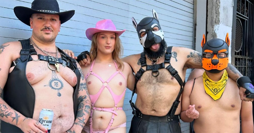 A group of four people dressed in fetish gear at Folsom Street Fair 2024.