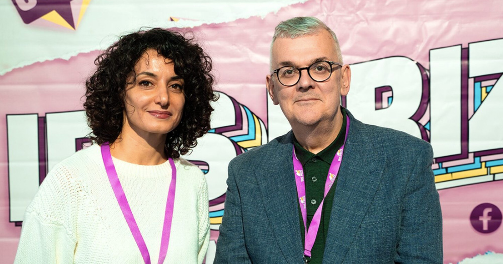 Palestinian filmmaker Dima Hamdan and the festivals director after she won the Iris Prize LGBTQ+ award for her film, Blood Like Water.