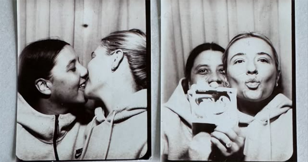 Black and white photobooth images of Sam Kerr and Kristie Mewis. They kiss and show their ultrasound scan.