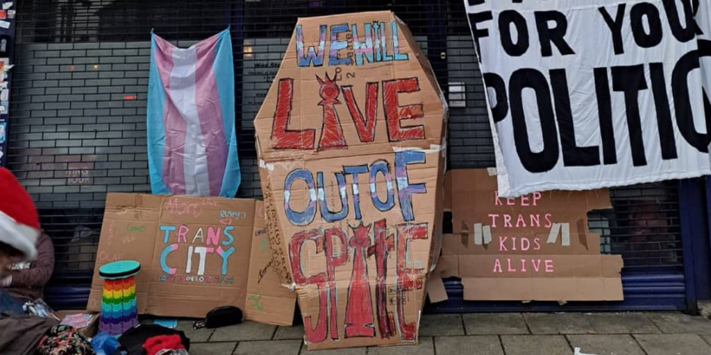 Trans Youth activists protest ban on puberty blockers with encampment outside Health Secretary's office