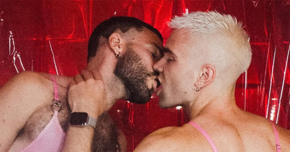 An image from Pornceptual of two men kissing.