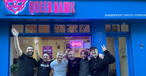 The Queer Hawk team outside their shop.