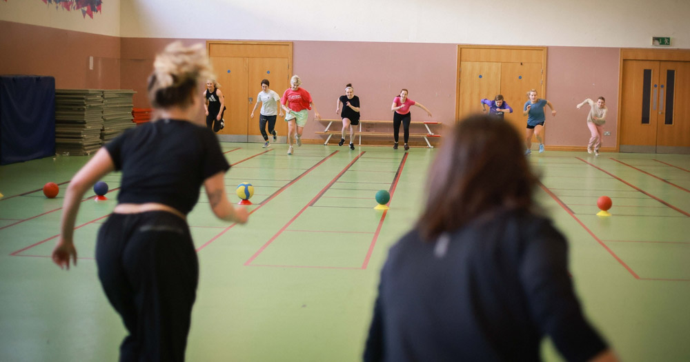 One of Sporting Pride's sports event for LGBTQ+ women and non-binary people inside of a sport centre