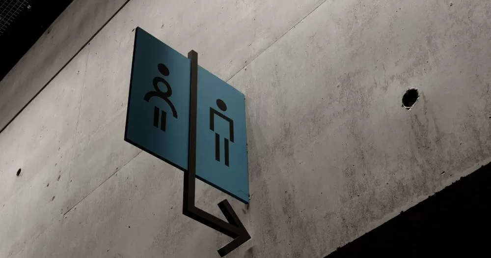 A bathroom sign indicating a single-sex bathroom facility.